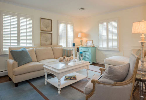 Cozy and elegant living room remodel with soft, neutral tones and natural light.