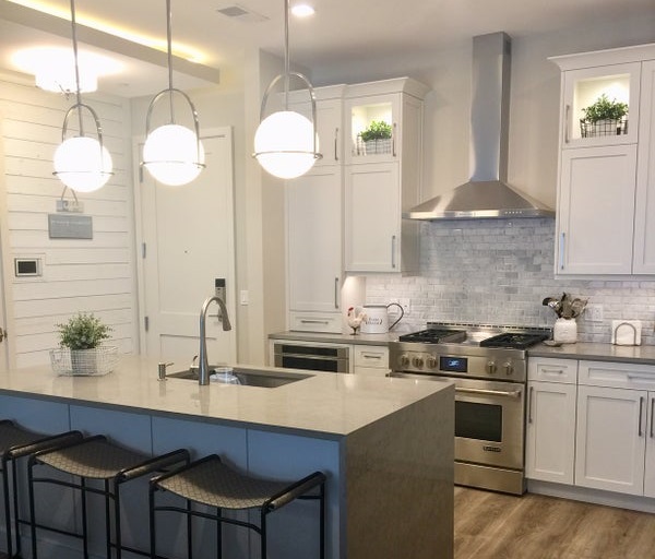 Modern kitchen with a sleek marble-look ceramic tile backsplash