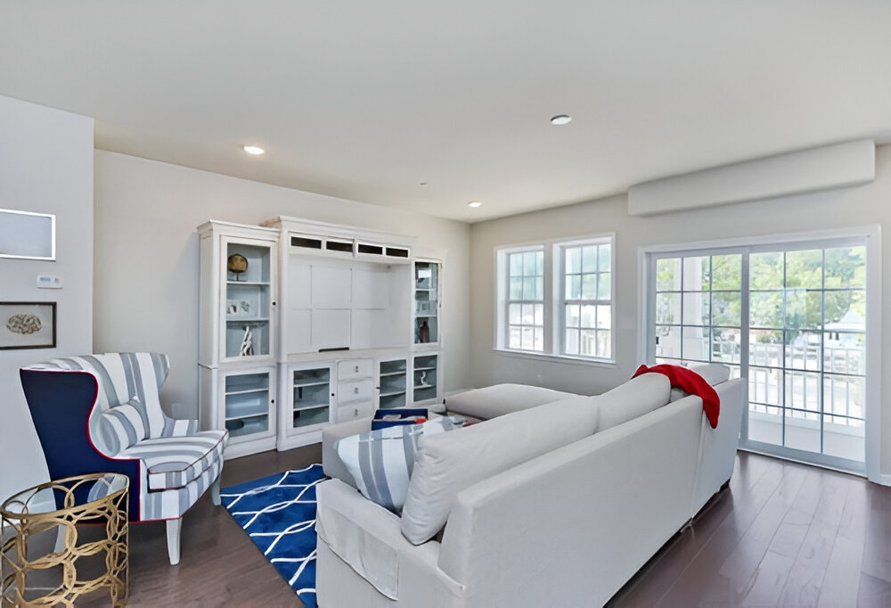 Stylish living room with a balanced furniture layout and natural light